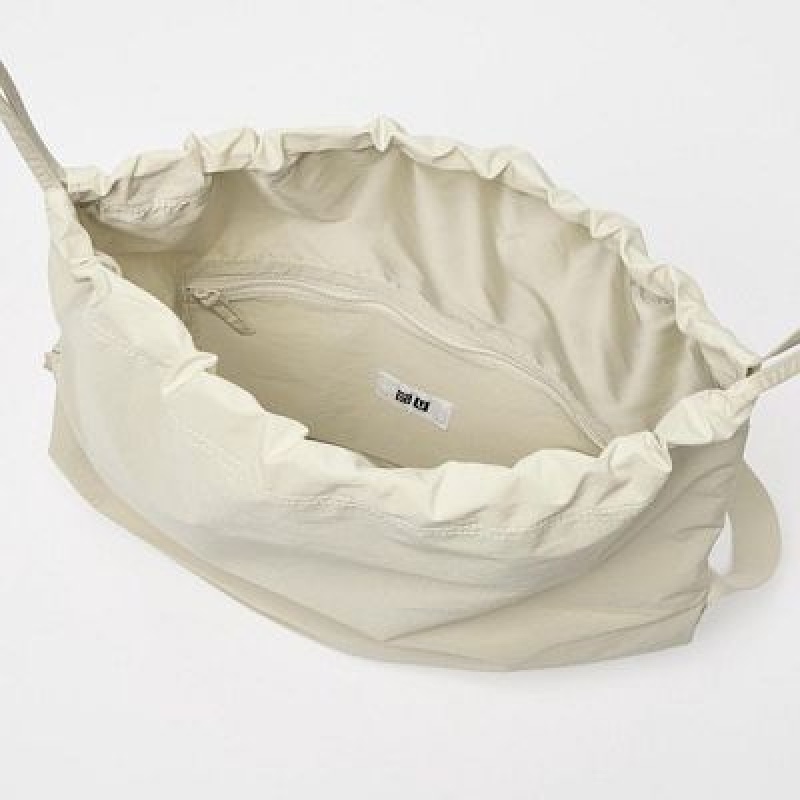 White Uniqlo Drawstring Women Tote Bags | 8409876